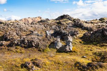 travel to Iceland - old rocks at Laugahraun volcanic lava field in Landmannalaugar area of Fjallabak Nature Reserve in Highlands region of Iceland in september