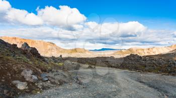 travel to Iceland - road in Laugahraun volcanic lava field in Landmannalaugar area of Fjallabak Nature Reserve in Highlands region of Iceland in september