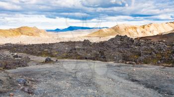 travel to Iceland - trail in Laugahraun volcanic lava field in Landmannalaugar area of Fjallabak Nature Reserve in Highlands region of Iceland in september