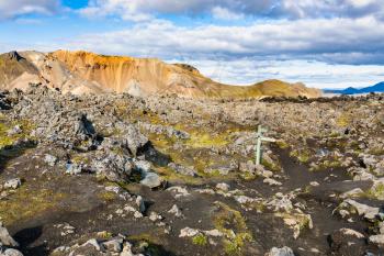 travel to Iceland - mark at Laugahraun volcanic lava field in Landmannalaugar area of Fjallabak Nature Reserve in Highlands region of Iceland in september
