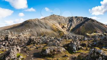 travel to Iceland - mount and at Laugahraun volcanic lava field in Landmannalaugar area of Fjallabak Nature Reserve in Highlands region of Iceland in september