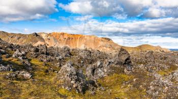 travel to Iceland - view of Laugahraun volcanic lava field in Landmannalaugar area of Fjallabak Nature Reserve in Highlands region of Iceland in september