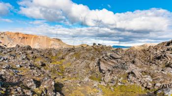 travel to Iceland - panoramic view of Laugahraun volcanic lava field in Landmannalaugar area of Fjallabak Nature Reserve in Highlands region of Iceland in september