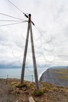 travel to Iceland - power line post on Dyrholaey peninsula near Vik I Myrdal village on Atlantic South Coast in Katla Geopark in september