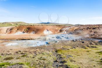 travel to Iceland - view of geothermal Krysuvik area with mud pools on Southern Peninsula (Reykjanesskagi, Reykjanes Peninsula) in september