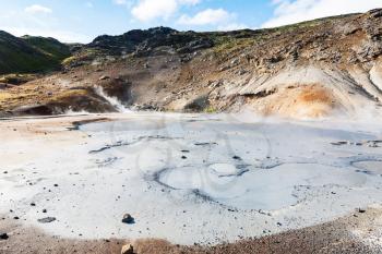 travel to Iceland - mud pot crater in geothermal Krysuvik area on Southern Peninsula (Reykjanesskagi, Reykjanes Peninsula) in september