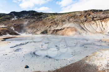 travel to Iceland - mudpot crater in geothermal Krysuvik area on Southern Peninsula (Reykjanesskagi, Reykjanes Peninsula) in september