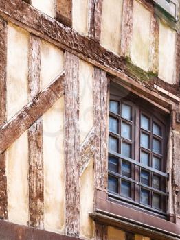 travel to France - window of old half-timbered house on street Rue Mole in Troyes city