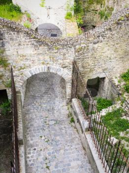 travel to France - above view of path at ruined walls from Porte des Degres (the gate in old fortified city wall) in Boulogne-sur-Mer city in summer
