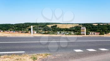 travel to France - country landscape along road route A28, E502 in Loir - Loire valley region in sunny summer day
