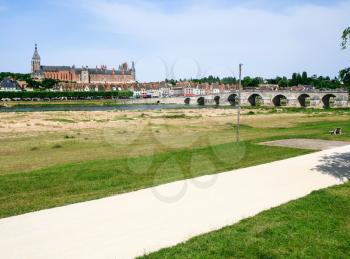 travel to France - view of Gien city from valley of Loire river in summer day