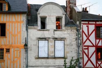travel to France - facades of old medieval urban houses in Orleans city on street Rue de la Charpenterie in summer evening