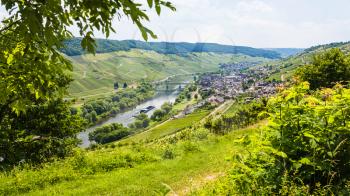 travel to Germany - above view of town in valley of Mosel river in Cochem - Zell region on Moselle wine route in sunny summer day