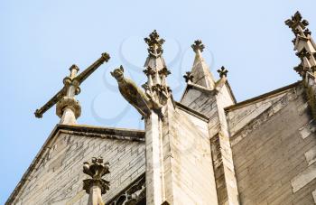 travel to France - cross and gargoyle of Basilique Saint-Urbain de Troyes (Basilica of Saint Urban of Troyes)
