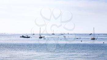 travel to France - boats in English Channel near Saint-Guirec beach of Perros-Guirec commune on Pink Granite Coast of Cotes-d'Armor department in the north of Brittany in summer morning