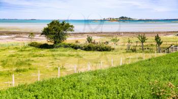 travel to France - rural landscape on coast of Anse de Beauport bay in Kerity district of Paimpol town in Cotes-d'Armor department of Brittany in summer sunny day