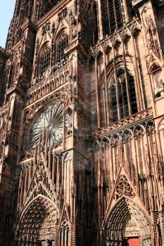 trave to France - view of west facade of Strasbourg Cathedral from of square Place du Chateau in summer evening