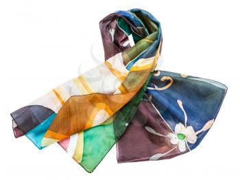 knotted hand painted batik silk scarf with abstract floral pattern isolated on white background