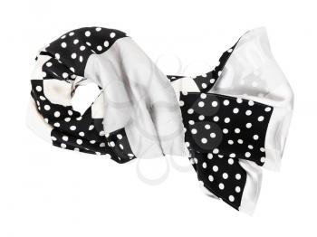 tied patchwork silk scarf sewn from polka dots fabric isolated on white background
