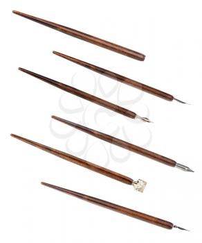 collection from brown penholders with various nibs isolated on white background