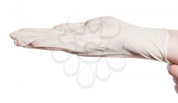 side view of hand wears latex glove on palm isolated on white background