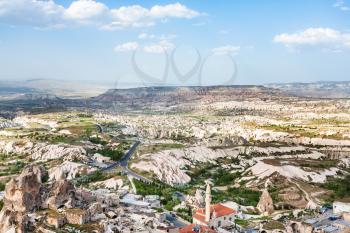 Travel to Turkey - above view of Uchisar town and roads in valley in Nevsehir Province in Cappadocia in spring