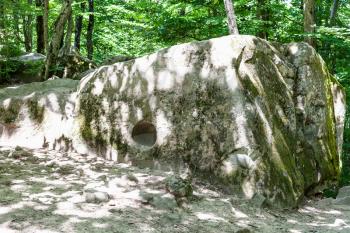 tour to Shapsugskaya anomalous zone - carved rock in ancient Shambala stone-pit in Abinsk Foothills of Caucasus Mountains in Kuban region of Russia
