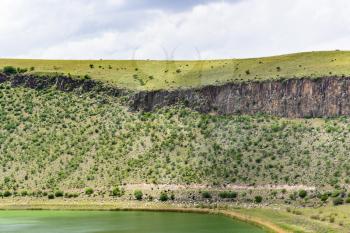 Travel to Turkey - Narligol Lake (Lake Nar) and old crater slope in Geothermal Field in Aksaray Province of Cappadocia in spring