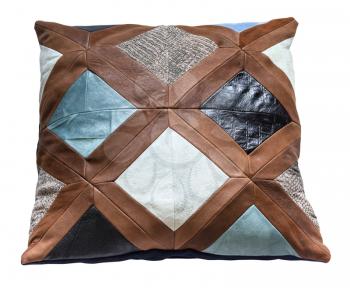 handmade patchwork leather throw pillow isolated on white background