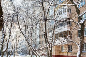 urban yard in residential district of Moscow city in winter day