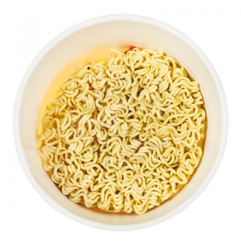 top view of open cup with dried instant noodles isolated on white background