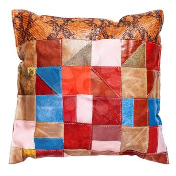 top view of handmade colorful patchwork leather pillow isolated on white background