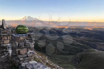 travel to North Caucasus region region - view of Mount Elbrus from viewpoint on Bermamyt mountain Plateau at dawn