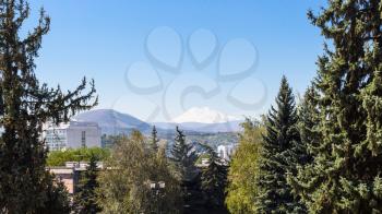 travel to Caucasian Mineral Waters region - view of snow-covered top of Mount Elbrus from Pyatigorsk city in autumn morning