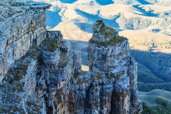 travel to North Caucasus region region - view of old rocks of Bermamyt Plateau at autumn morning
