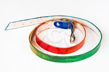 handmade rainbow coloured leather belt on white background