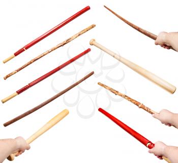 collection of various wood sticks as a weapons isolated on white background