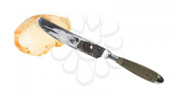 top view of knife and open sandwich with fresh bread and butter isolated on white background
