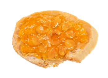 top view of open sandwich with fresh bread and apricot jelly isolated on white background