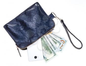 top view of open small blue leather wristlet purse bag with phone, credit cards and dollars isolated on white backgroun