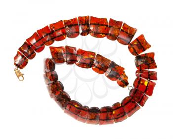 top view of coiled necklace from polished faceted amber flat pieces isolated on white background