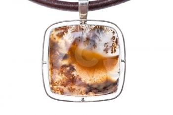 polished natural Moss Agate with dendritic inclusion in pendant close up isolated on white background