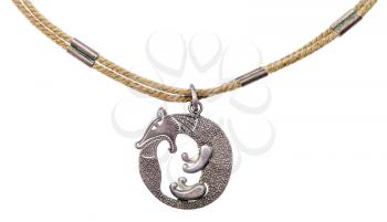 handmade silver Pendant with figure of Fox Biting Its Tail on rope close up isolated on white background
