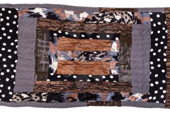 part of handmade brown patchwork scarf isolated on white background