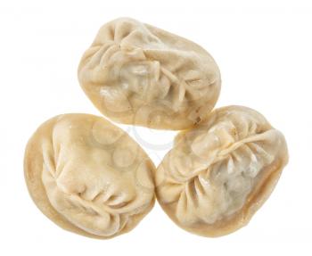 top view of few cooked Manti (steamed dumpling stuffed with minced meat and chopped onion in central asian cuisine) isolated on white background