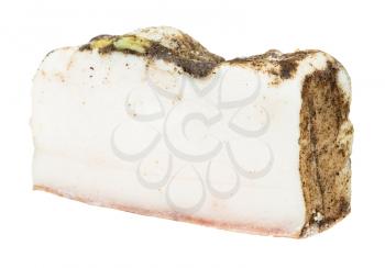 chunk of Salo (salted pork fatback) with garlic and black pepper isolated on white background