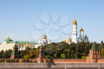 view of Kremlin cathedrals in Moscow city from Bolshoy Moskvoretsky Bridge on sunny September day