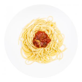 top view of served Spaghetti alla Sorrentina on white plate isolated on white background