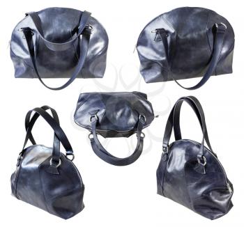 set of handmade dark blue leather handbag isolated on white background
