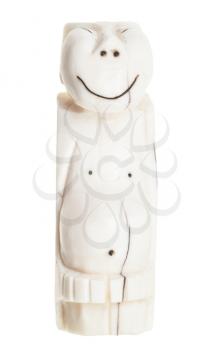 traditional bone carving of the peoples of the north of Russia (Chukchi) - Peliken figurine carved from walrus ivory isolated on white background
